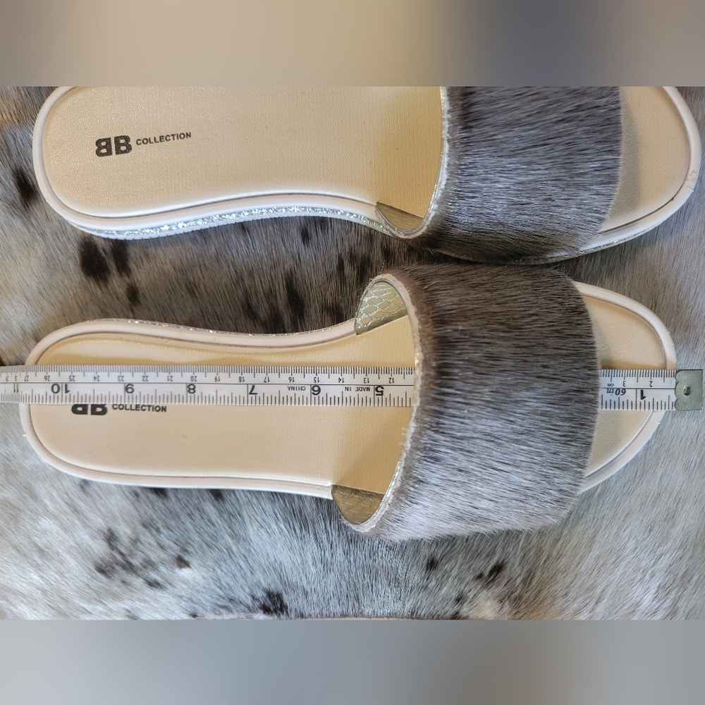 Sealskin slippers size 10 feels like size 9 wide